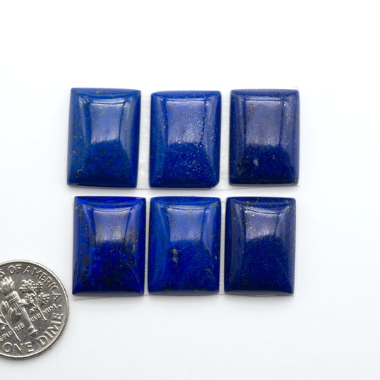 Shop natural Lapis Lazuli cabochons with rich blue tones and golden pyrite, perfect for silversmiths and jewelry makers designing custom pieces.