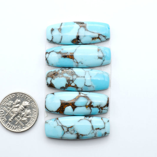 Enhance your jewelry designs with Pressed Turquoise Nugget Cabochons. Crafted from composite materials they add a captivating touch to your creations.