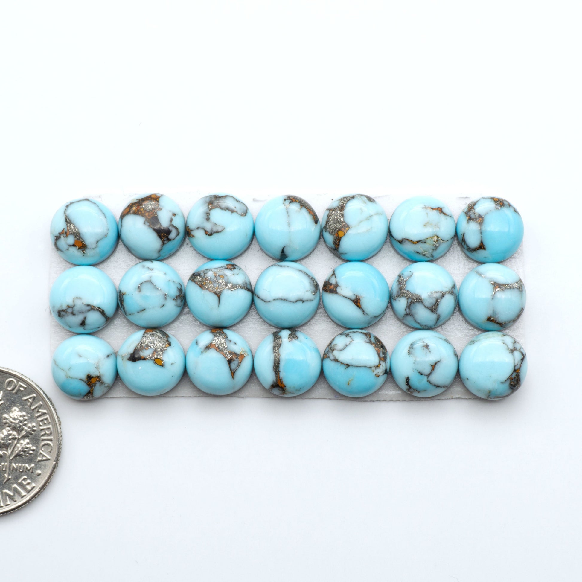 Enhance your jewelry designs with Pressed Turquoise Nugget Cabochons. Crafted from composite materials they add a captivating touch to your creations.