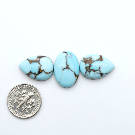 Enhance your jewelry designs with Pressed Turquoise Nugget Cabochons. Crafted from composite materials they add a captivating touch to your creations.