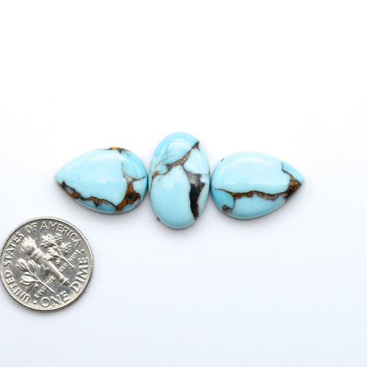 Enhance your jewelry designs with Pressed Turquoise Nugget Cabochons. Crafted from composite materials they add a captivating touch to your creations.