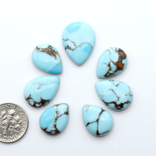 Enhance your jewelry designs with Pressed Turquoise Nugget Cabochons. Crafted from composite materials they add a captivating touch to your creations.