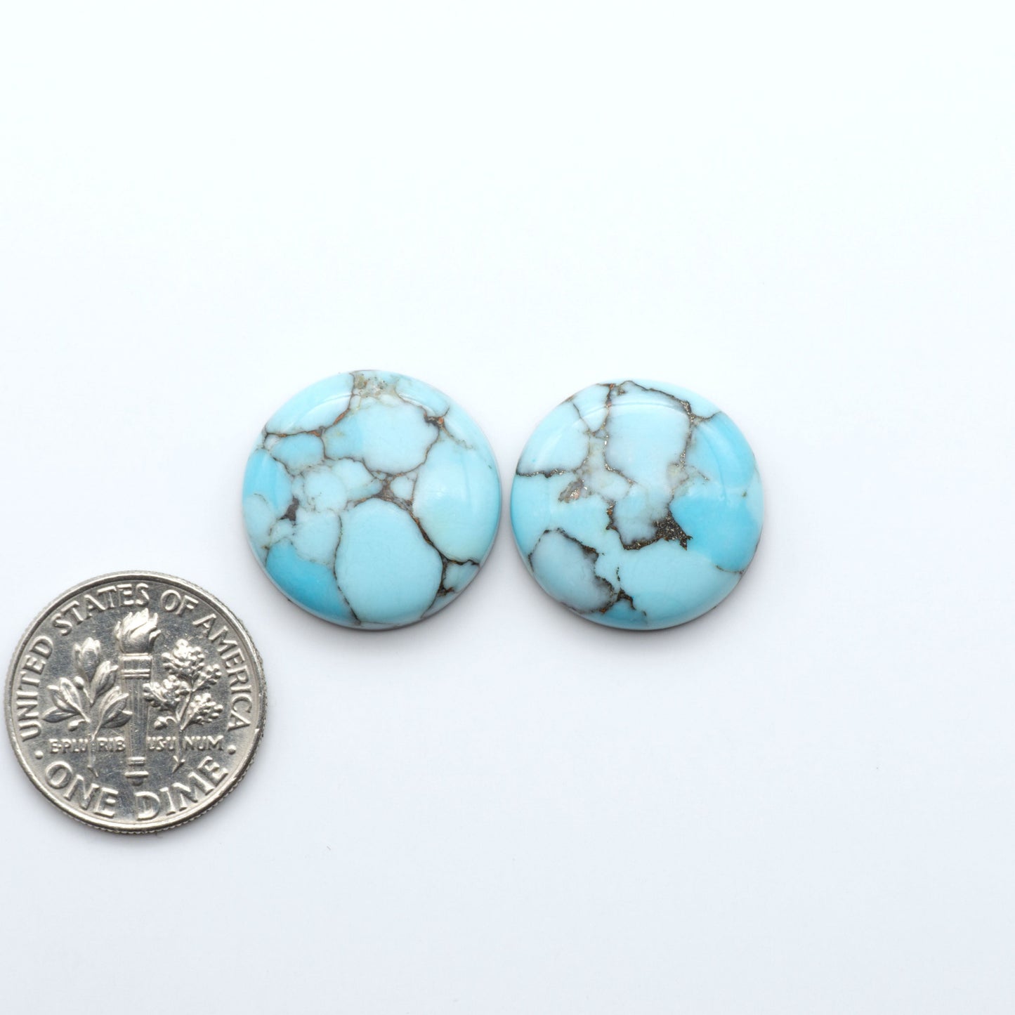 Enhance your jewelry designs with Pressed Turquoise Nugget Cabochons. Crafted from composite materials they add a captivating touch to your creations.