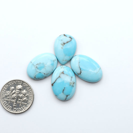 Enhance your jewelry designs with Pressed Turquoise Nugget Cabochons. Crafted from composite materials they add a captivating touch to your creations.