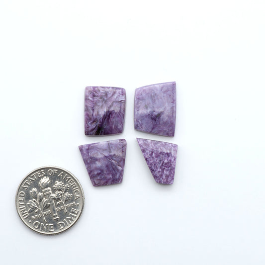 natural Charoite cabochons with vivid violet swirls, perfect for jewelry makers and silversmiths creating rings, pendants, and custom designs.
