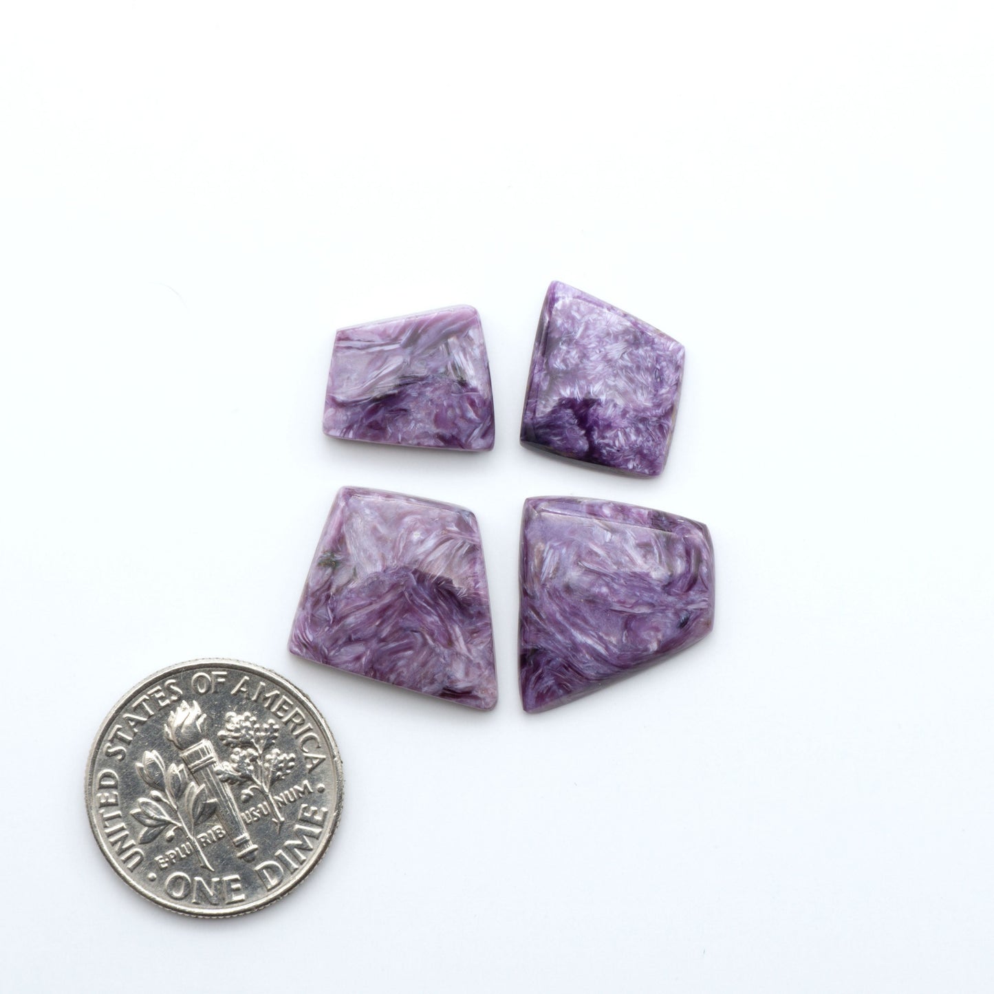 natural Charoite cabochons with vivid violet swirls, perfect for jewelry makers and silversmiths creating rings, pendants, and custom designs.