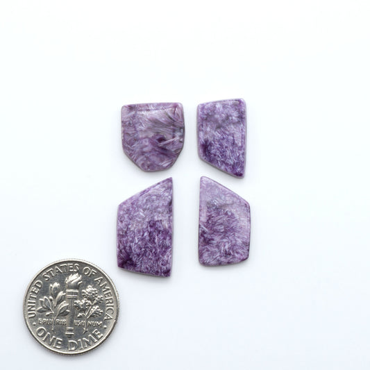 natural Charoite cabochons with vivid violet swirls, perfect for jewelry makers and silversmiths creating rings, pendants, and custom designs.
