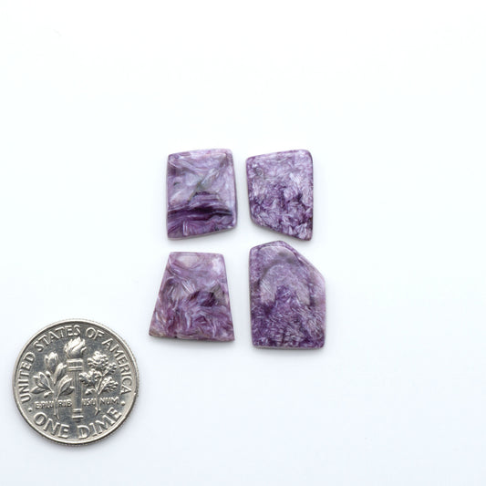 natural Charoite cabochons with vivid violet swirls, perfect for jewelry makers and silversmiths creating rings, pendants, and custom designs.