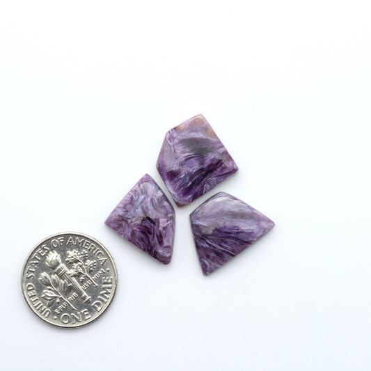 natural Charoite cabochons with vivid violet swirls, perfect for jewelry makers and silversmiths creating rings, pendants, and custom designs.