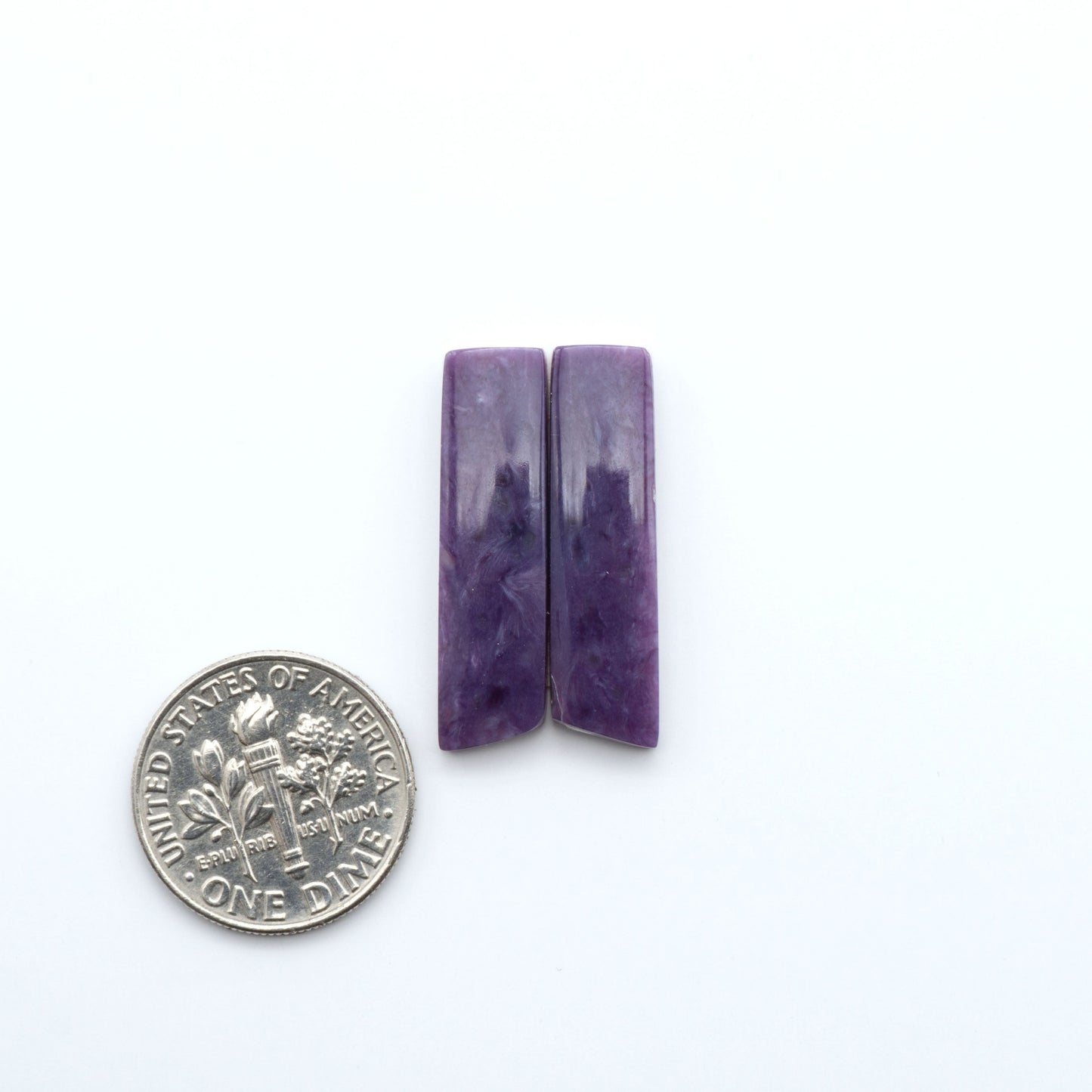natural Charoite cabochons with vivid violet swirls, perfect for jewelry makers and silversmiths creating rings, pendants, and custom designs.