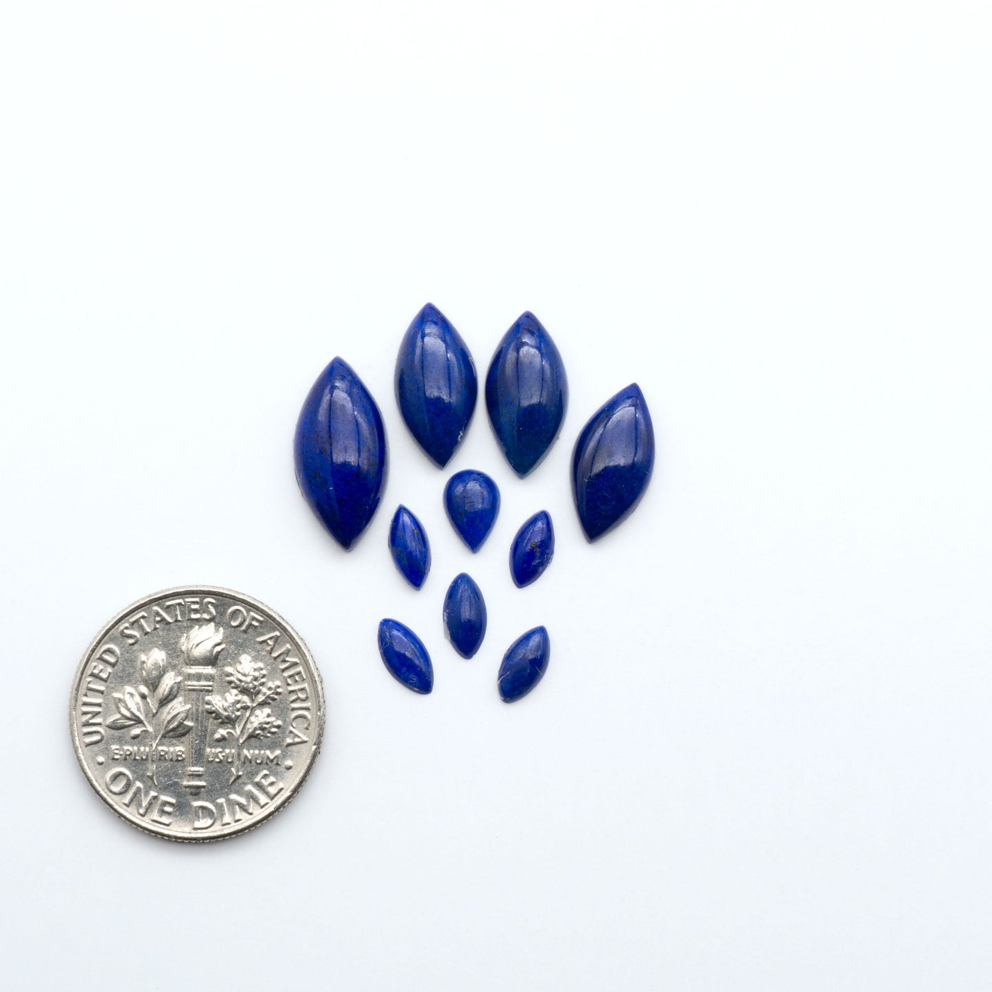 Shop natural Lapis Lazuli cabochons with rich blue tones and golden pyrite, perfect for silversmiths and jewelry makers designing custom pieces.


