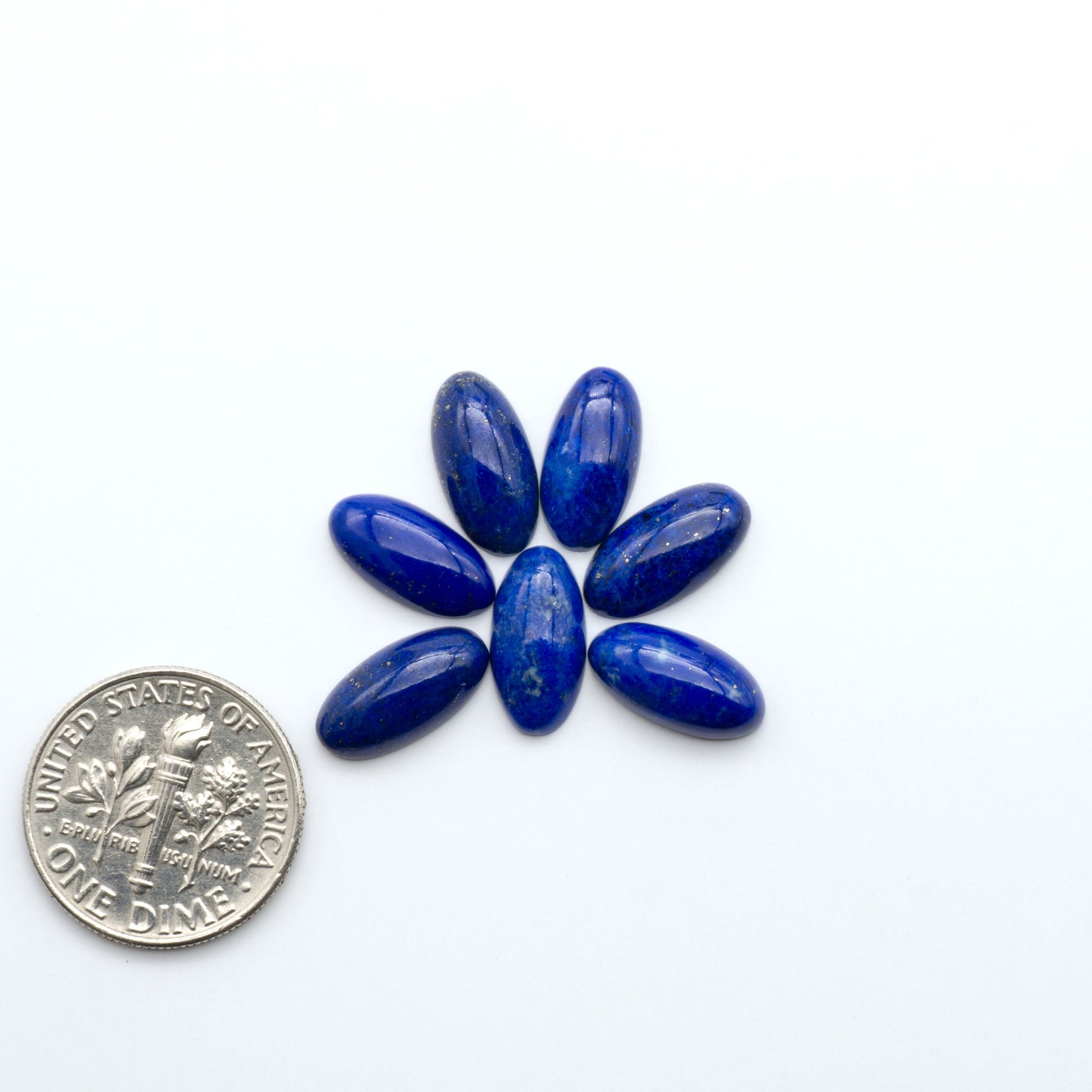 Shop natural Lapis Lazuli cabochons with rich blue tones and golden pyrite, perfect for silversmiths and jewelry makers designing custom pieces.

