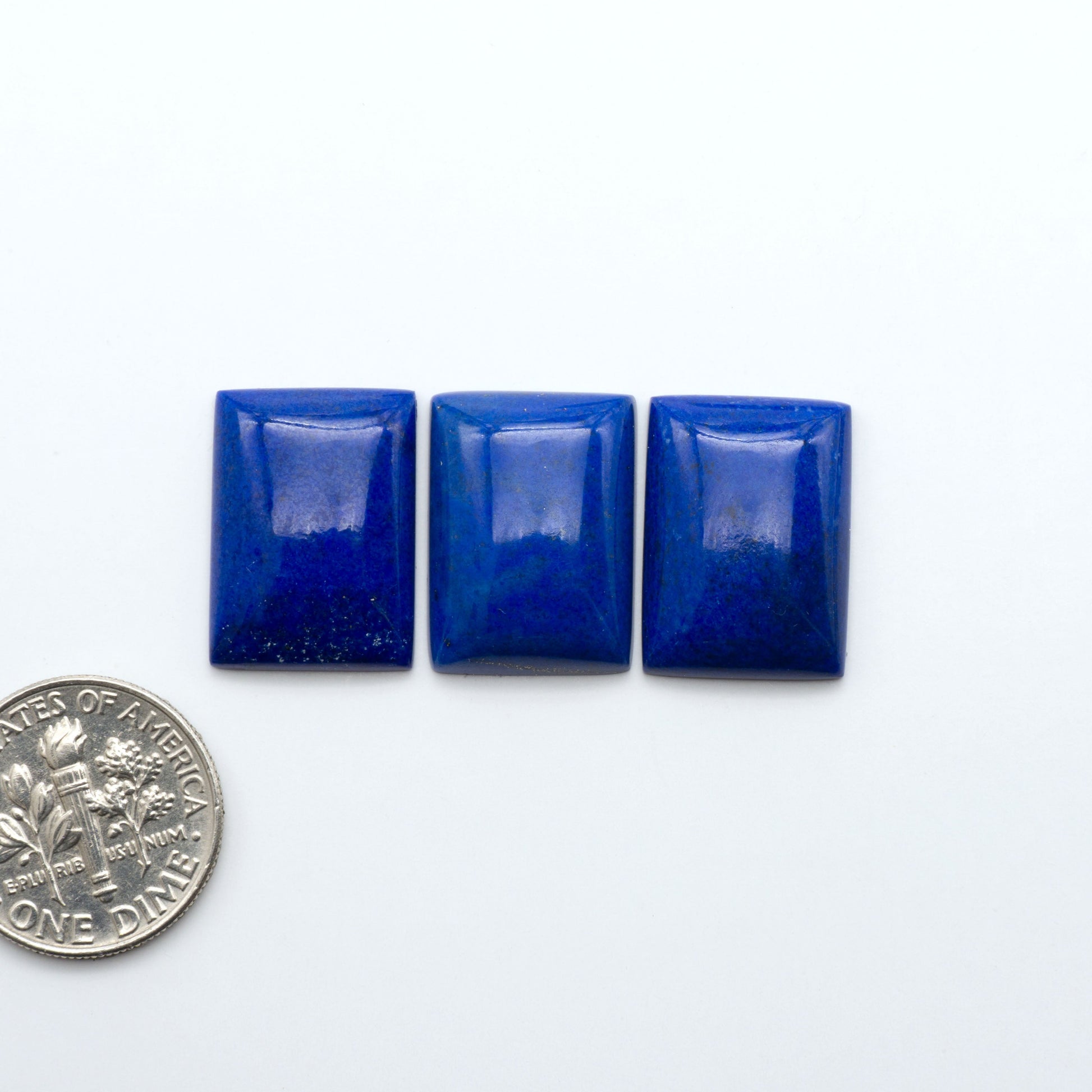 Shop natural Lapis Lazuli cabochons with rich blue tones and golden pyrite, perfect for silversmiths and jewelry makers designing custom pieces.

