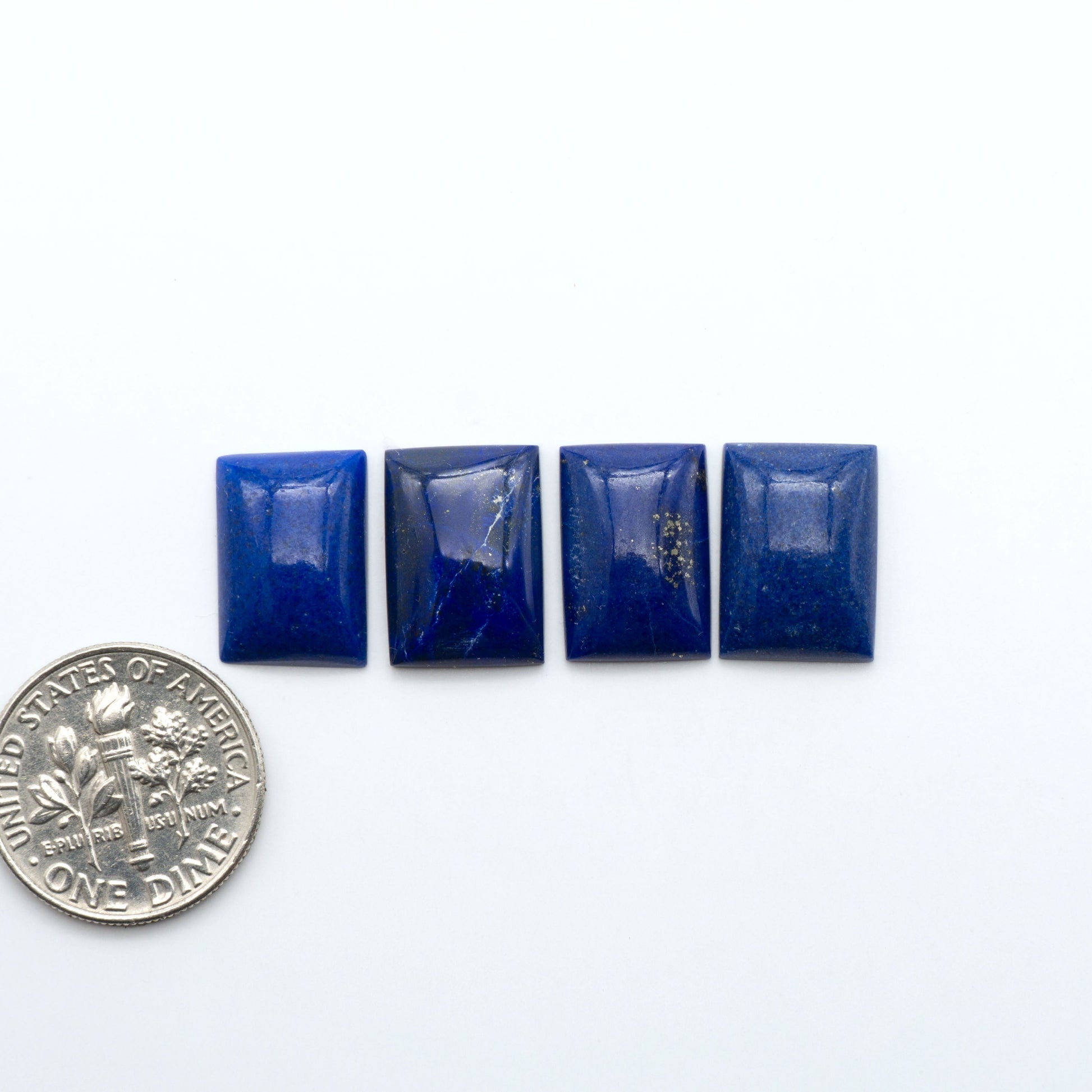 Shop natural Lapis Lazuli cabochons with rich blue tones and golden pyrite, perfect for silversmiths and jewelry makers designing custom pieces.

