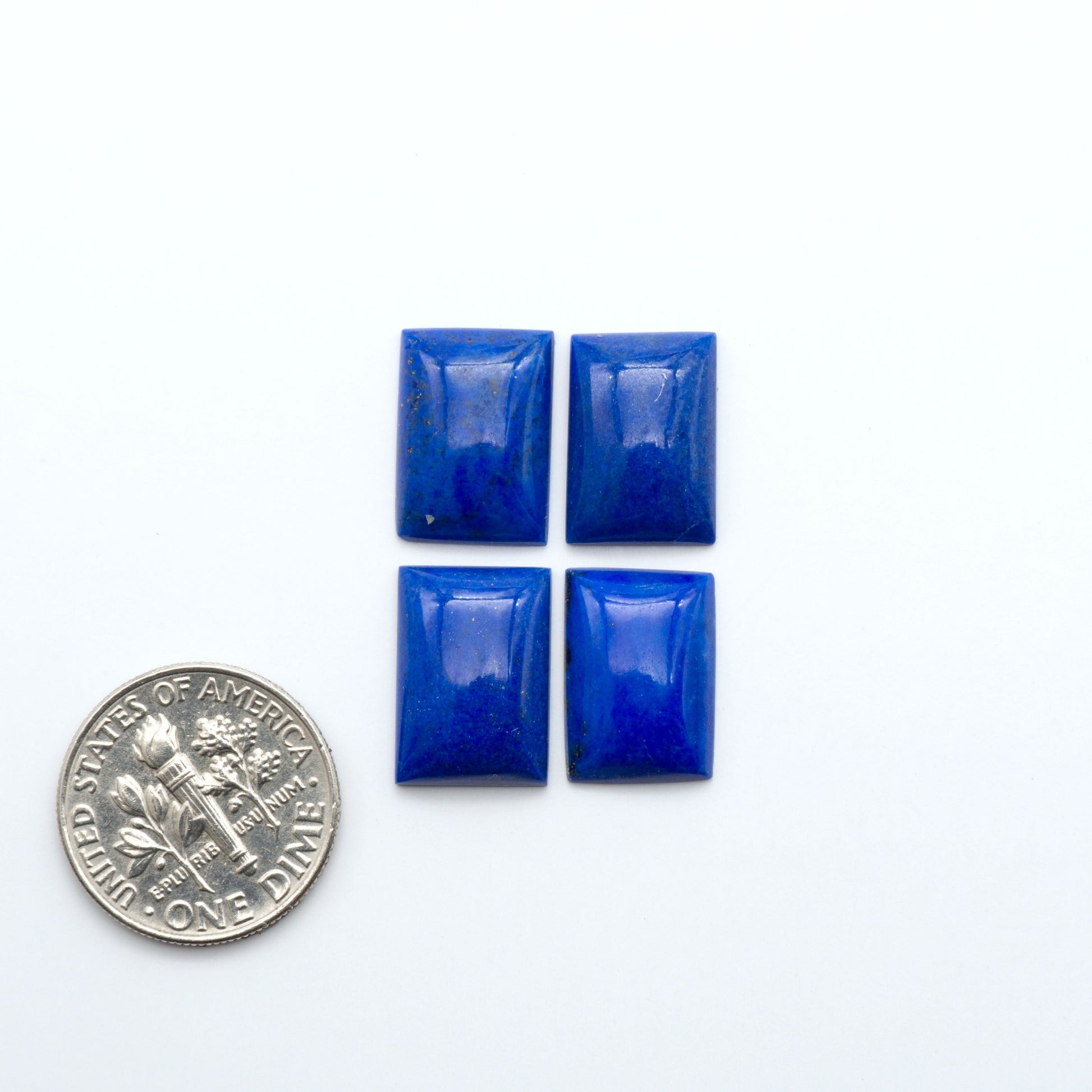 Shop natural Lapis Lazuli cabochons with rich blue tones and golden pyrite, perfect for silversmiths and jewelry makers designing custom pieces.

