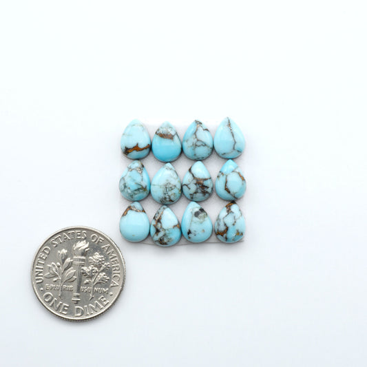 Enhance your jewelry designs with Pressed Turquoise Nugget Cabochons. Crafted from composite materials they add a captivating touch to your creations.

