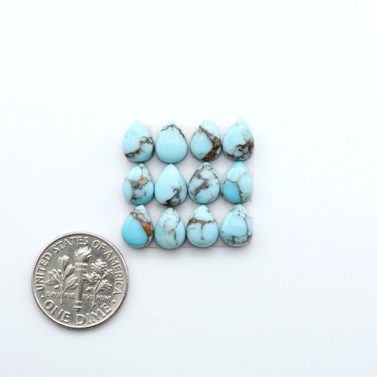 Enhance your jewelry designs with Pressed Turquoise Nugget Cabochons. Crafted from composite materials they add a captivating touch to your creations.

