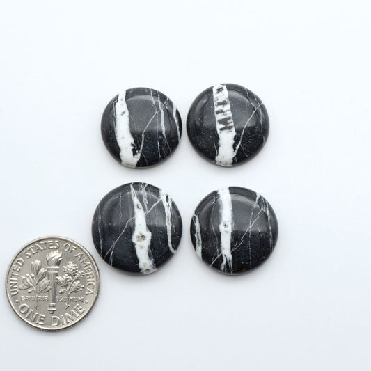 Natural White Buffalo Stone Cabochons are semi-precious gemstones cut into shapes ideal for jewelry-making, making them an excellent choice for artisans.