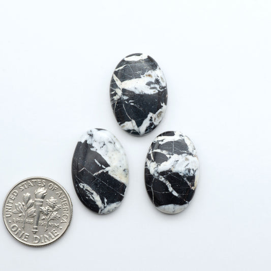 Natural White Buffalo Stone Cabochons are semi-precious gemstones cut into shapes ideal for jewelry-making, making them an excellent choice for artisans.