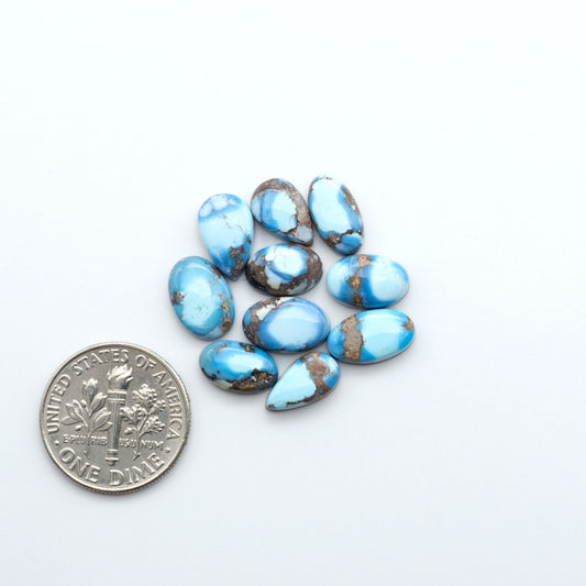 Discover the beauty of Natural Golden Hills Turquoise—prized for its icy blue tones, golden matrix, and exceptional quality. Ideal for artisan jewelry designs.