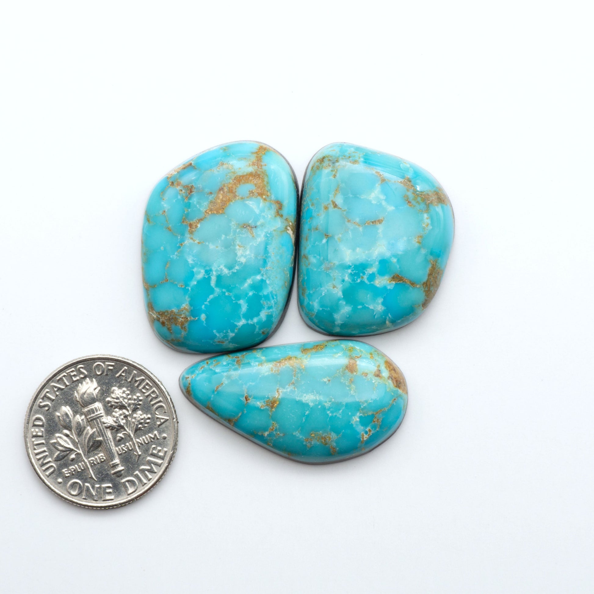 Shop authentic Blue Gem Turquoise cabochons—rare Nevada stones with vibrant blues and greens, perfect for artisan jewelry and collectors.