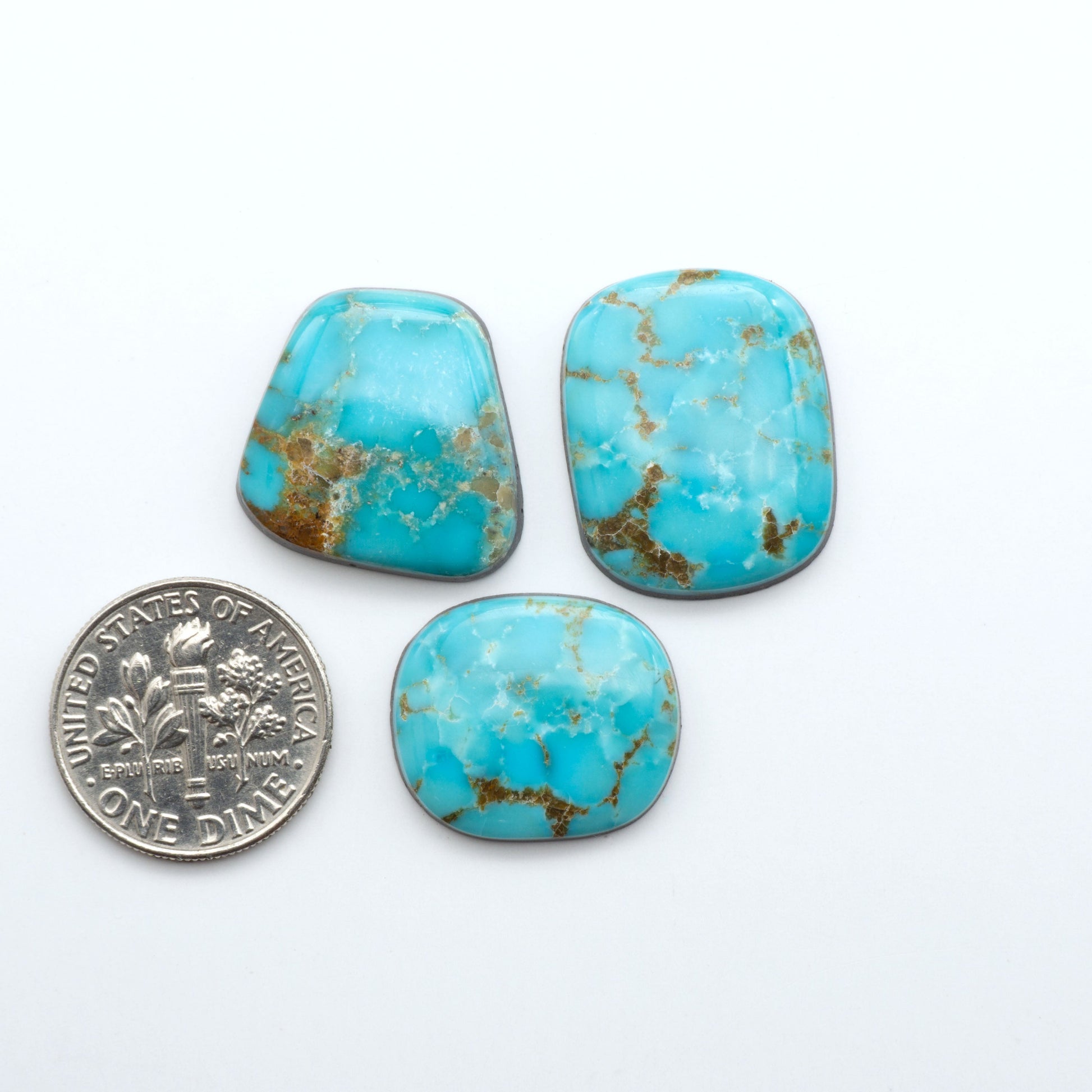 Shop authentic Blue Gem Turquoise cabochons—rare Nevada stones with vibrant blues and greens, perfect for artisan jewelry and collectors.