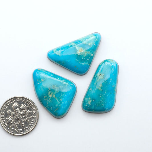 Shop authentic Blue Gem Turquoise cabochons—rare Nevada stones with vibrant blues and greens, perfect for artisan jewelry and collectors.