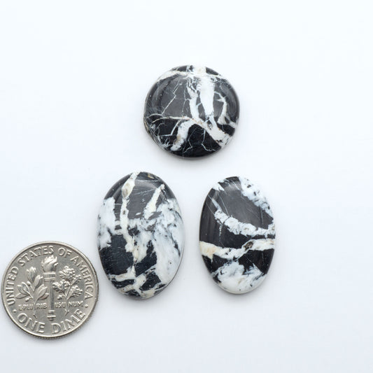 Natural White Buffalo Stone Cabochons are semi-precious gemstones cut into shapes ideal for jewelry-making, making them an excellent choice for artisans.


