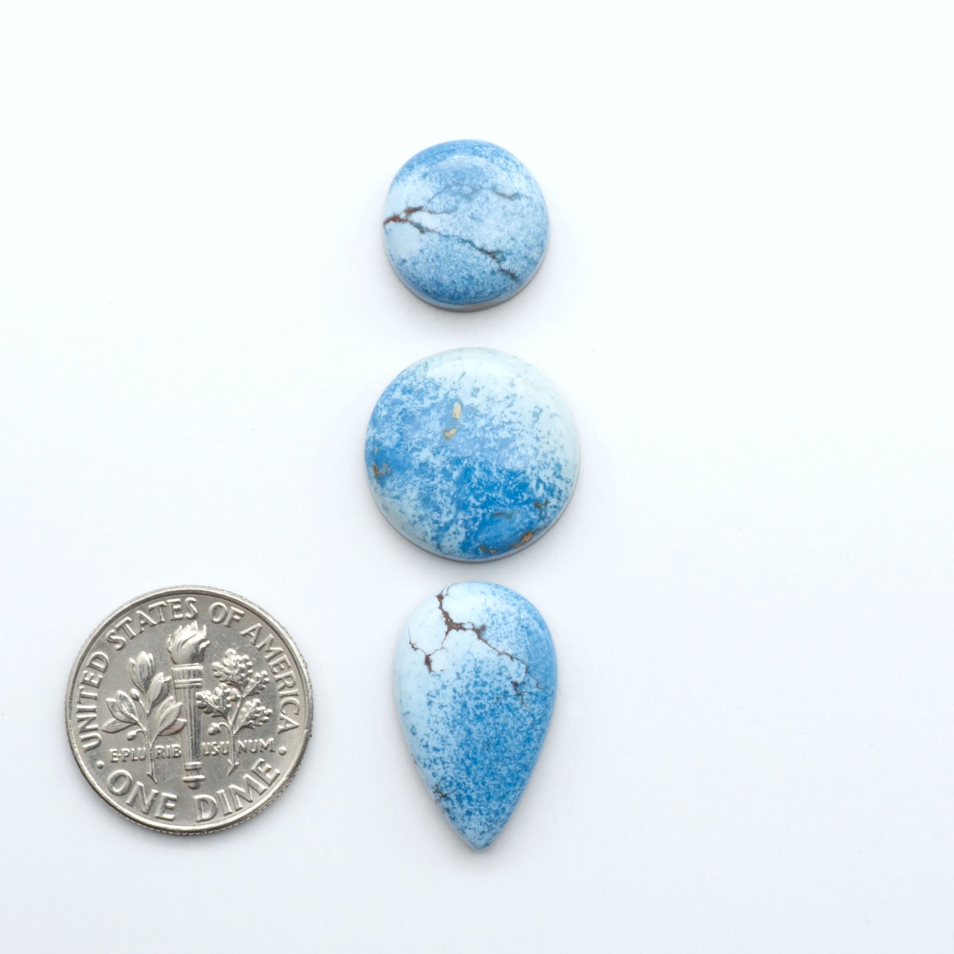 Discover the beauty of Natural Golden Hills Turquoise—prized for its icy blue tones, golden matrix, and exceptional quality. Ideal for artisan jewelry designs.

