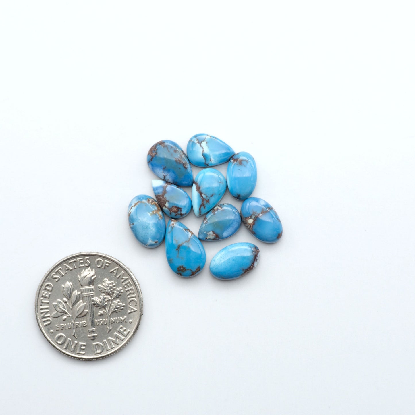 Discover the beauty of Natural Golden Hills Turquoise—prized for its icy blue tones, golden matrix, and exceptional quality. Ideal for artisan jewelry designs.

