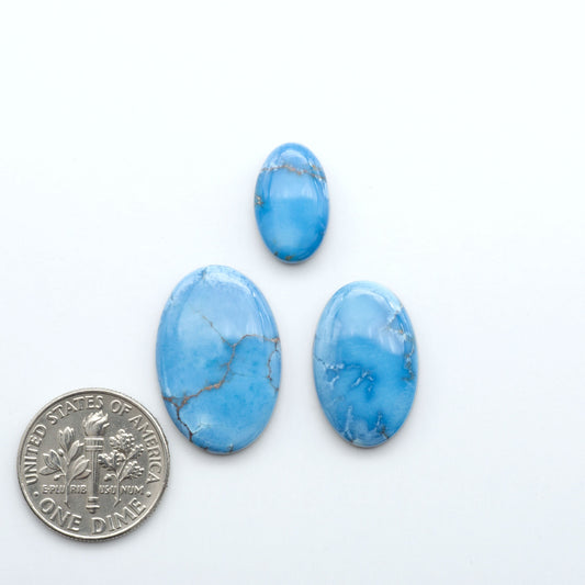 Discover the beauty of Natural Golden Hills Turquoise—prized for its icy blue tones, golden matrix, and exceptional quality. Ideal for artisan jewelry designs.

