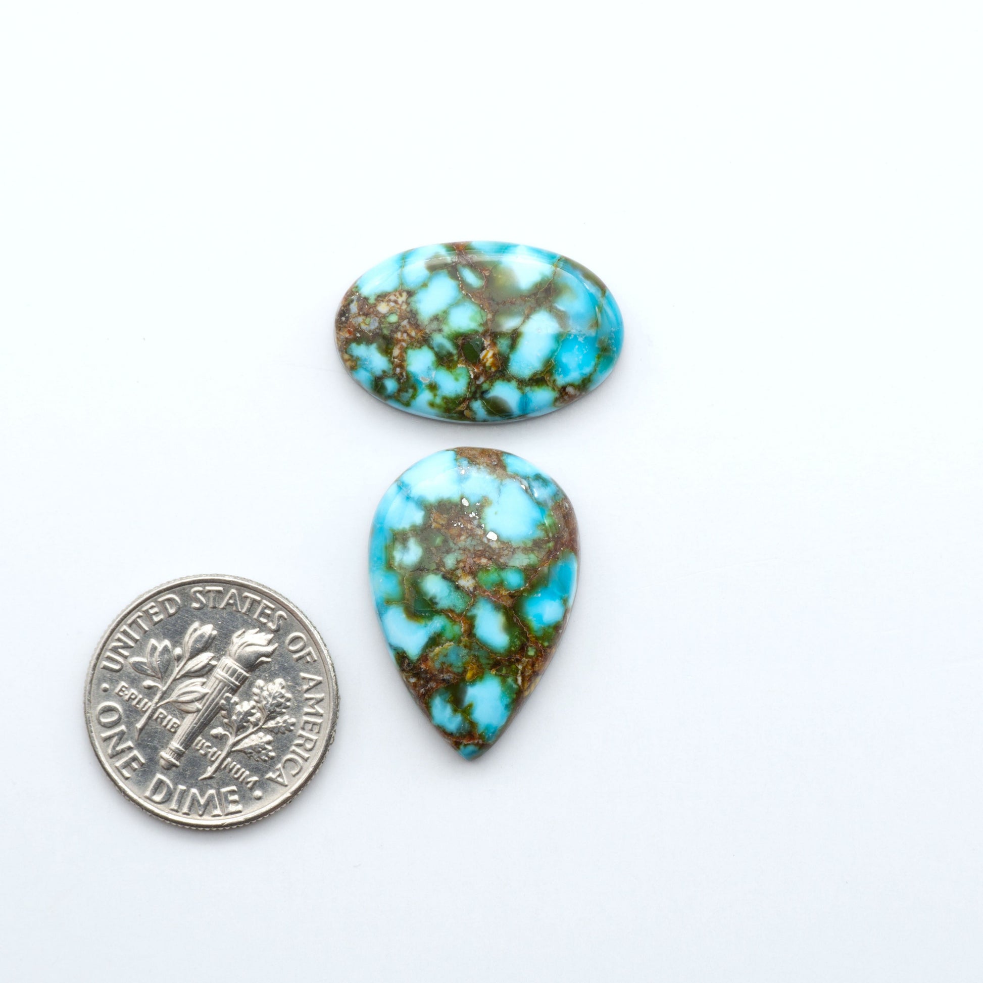 Kingman Turquoise Cabochons are a staple in the jewelry industry, known for their stunning blue-green color. Perfect for necklaces, earrings, and more!