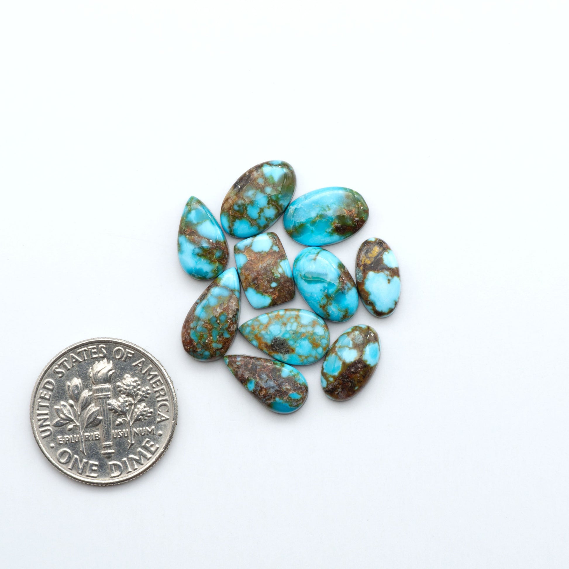 Kingman Turquoise Cabochons are a staple in the jewelry industry, known for their stunning blue-green color. Perfect for necklaces, earrings, and more!