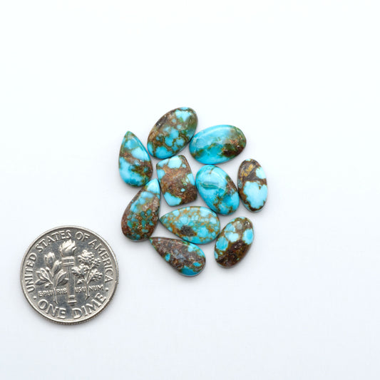 Kingman Turquoise Cabochons are a staple in the jewelry industry, known for their stunning blue-green color. Perfect for necklaces, earrings, and more!