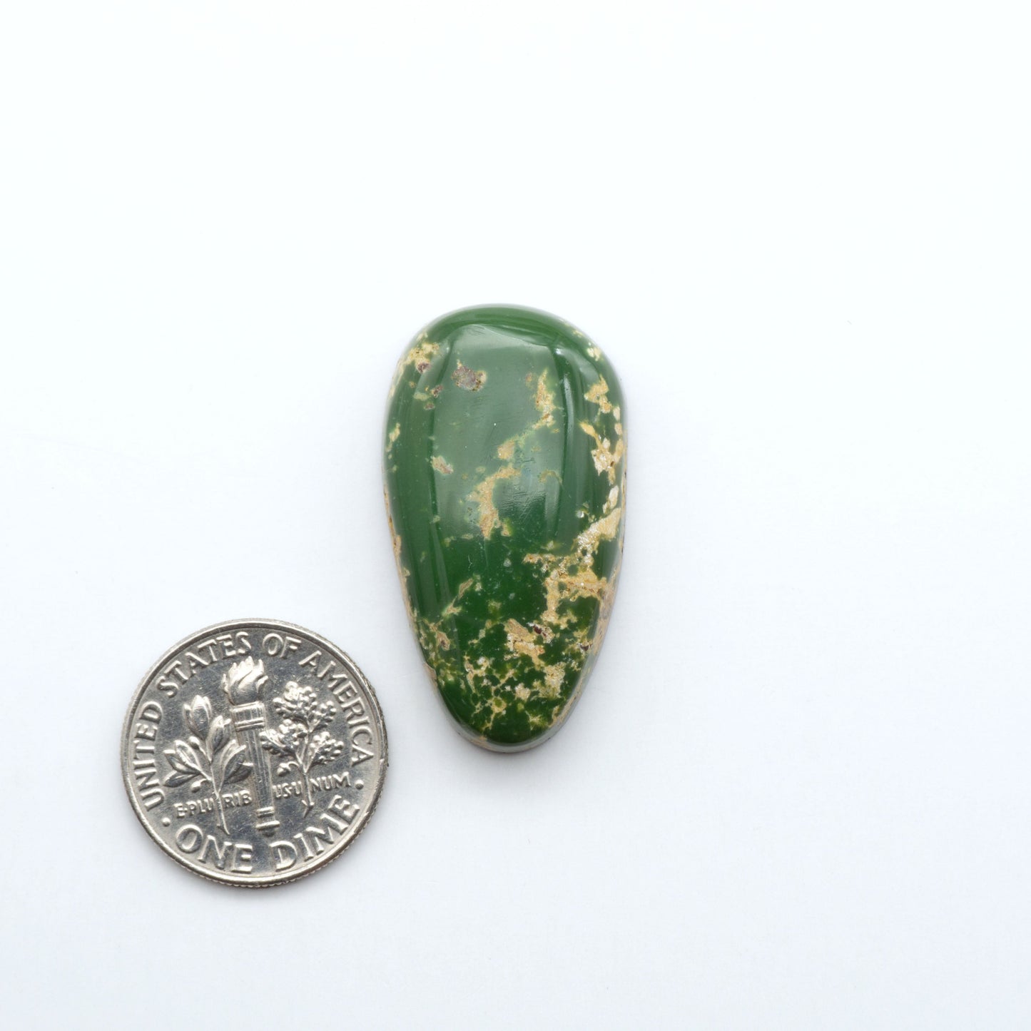 Hand-cut Natural Cerrillos Turquoise cabochons with rare blue-green hues and historic New Mexico origins—perfect for artisan jewelry.