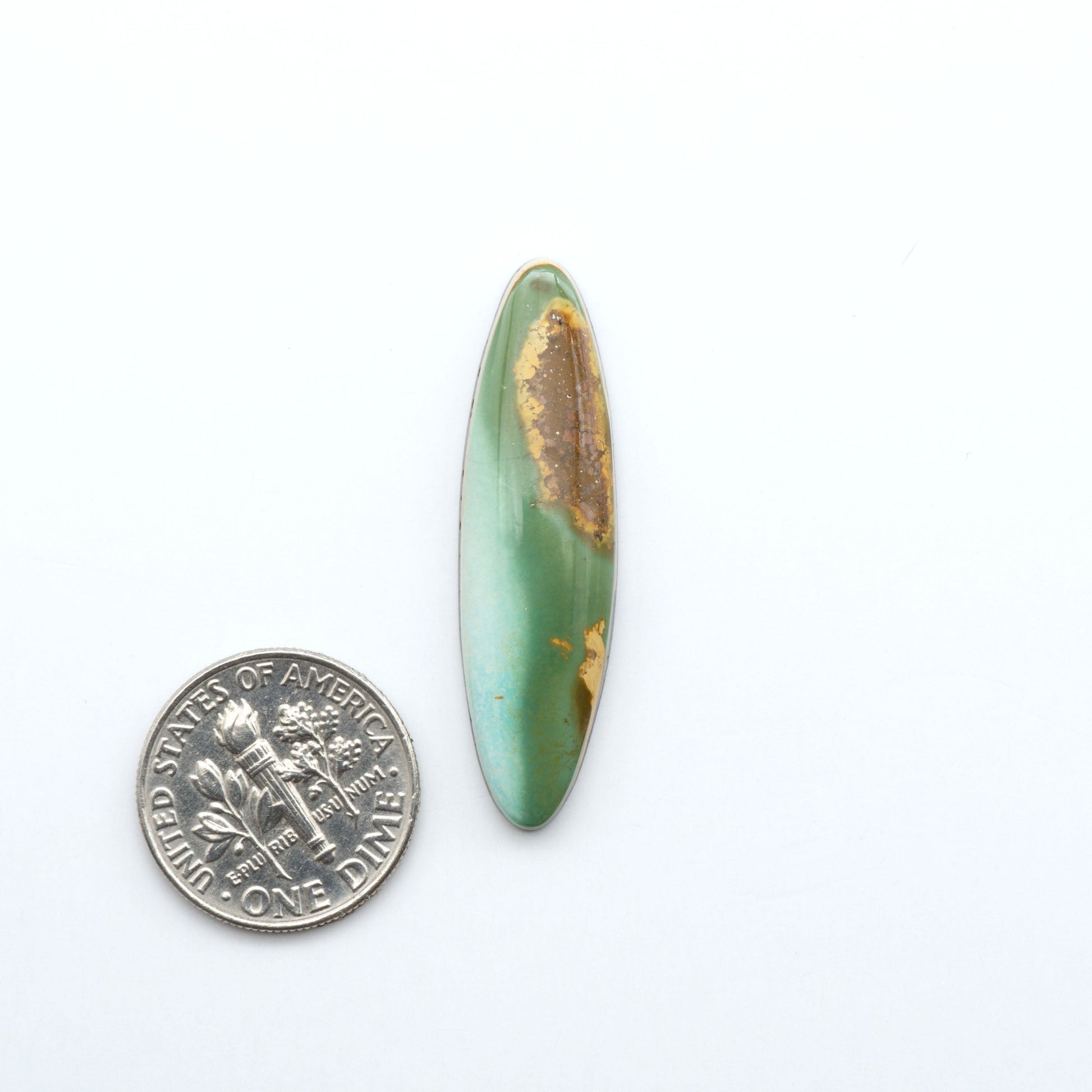 Hand-cut Natural Cerrillos Turquoise cabochons with rare blue-green hues and historic New Mexico origins—perfect for artisan jewelry.