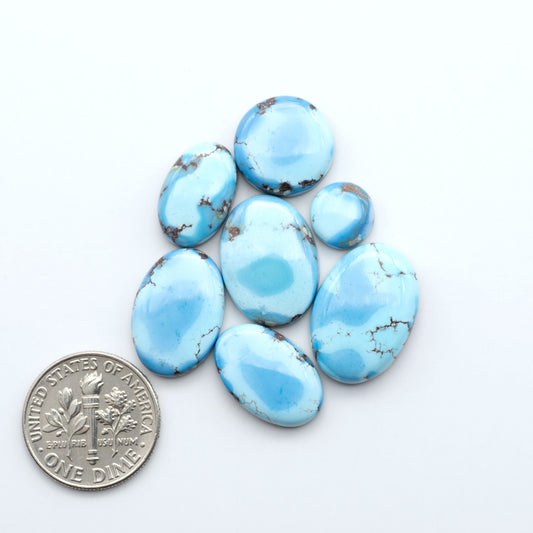Discover the beauty of Natural Golden Hills Turquoise—prized for its icy blue tones, golden matrix, and exceptional quality. Ideal for artisan jewelry designs.