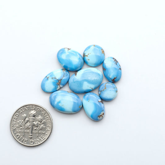 Discover the beauty of Natural Golden Hills Turquoise—prized for its icy blue tones, golden matrix, and exceptional quality. Ideal for artisan jewelry designs.
