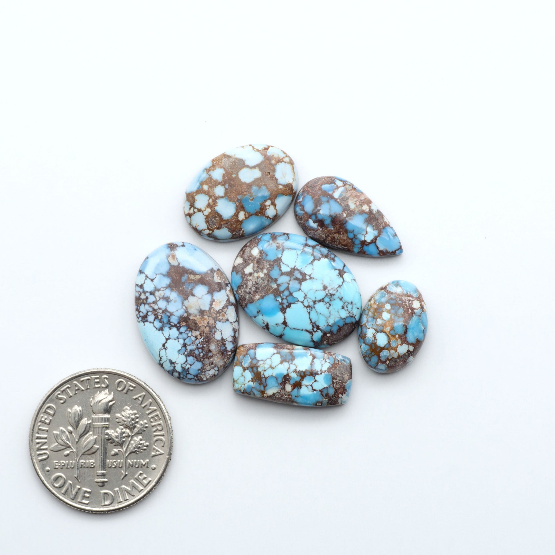 Discover the beauty of Natural Golden Hills Turquoise—prized for its icy blue tones, golden matrix, and exceptional quality. Ideal for artisan jewelry designs.