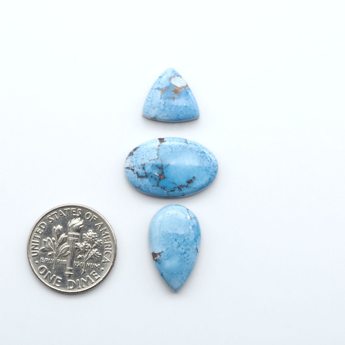 Discover the beauty of Natural Golden Hills Turquoise—prized for its icy blue tones, golden matrix, and exceptional quality. Ideal for artisan jewelry designs.