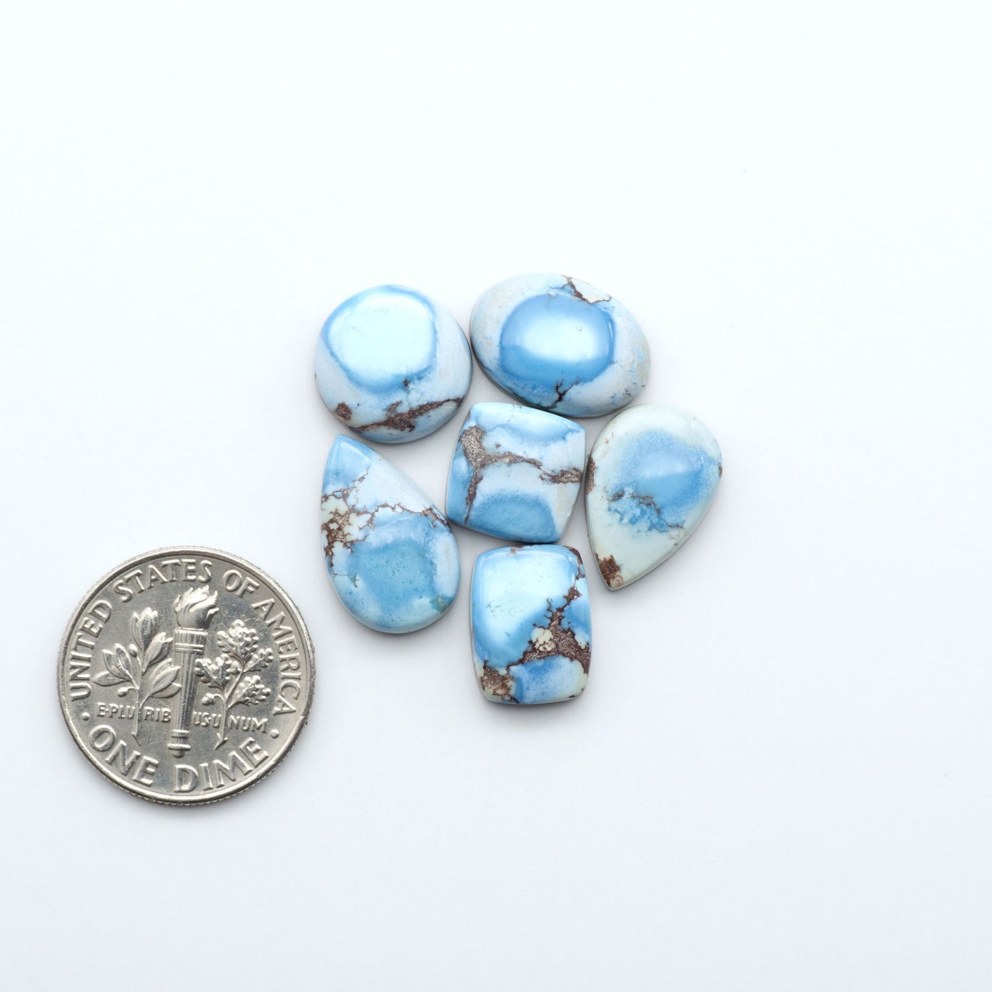 Discover the beauty of Natural Golden Hills Turquoise—prized for its icy blue tones, golden matrix, and exceptional quality. Ideal for artisan jewelry designs.