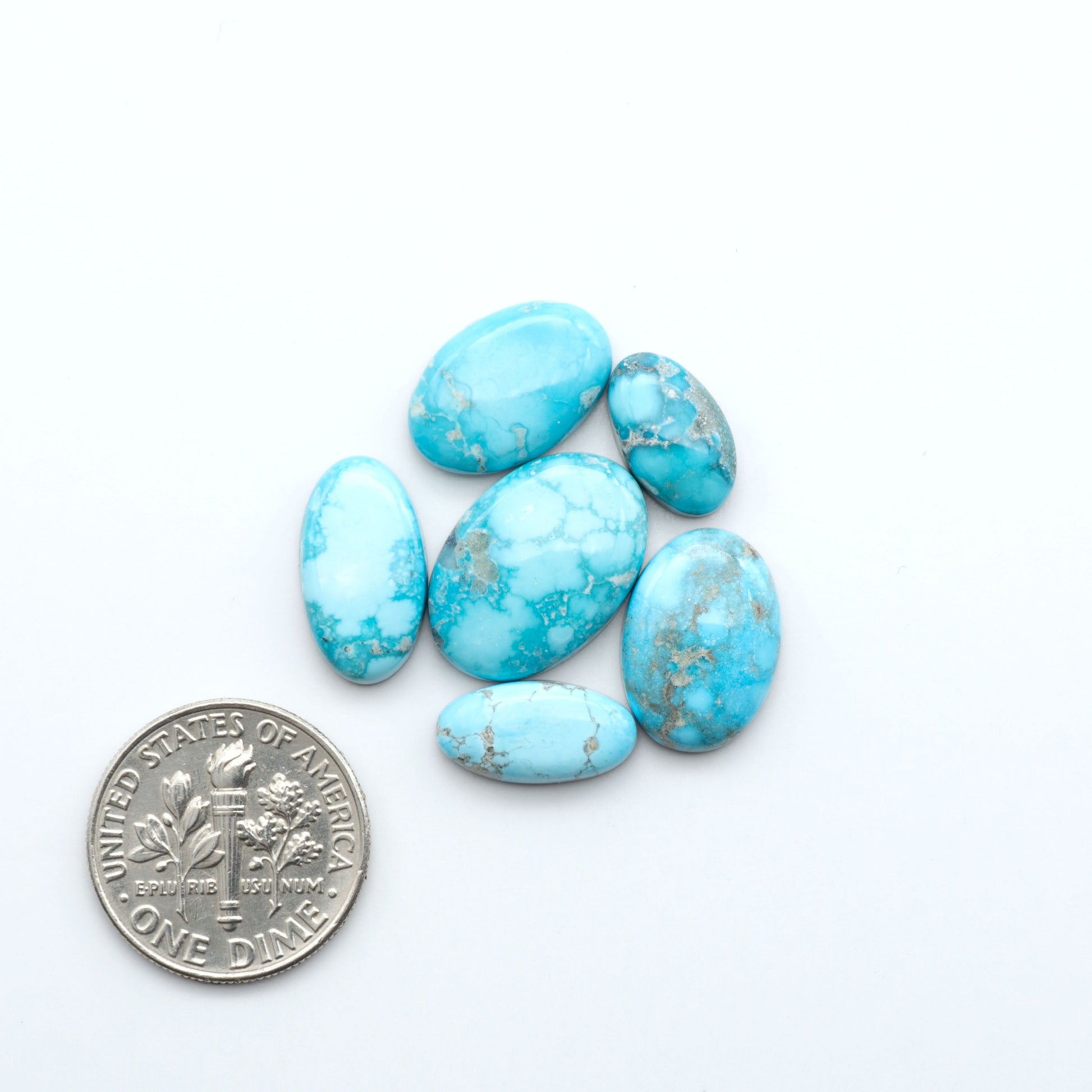 Create stunning handcrafted jewelry with Blue Bird Turquoise Cabochons. Their rich blue color and polish make them perfect for silversmiths and jewelry makers.