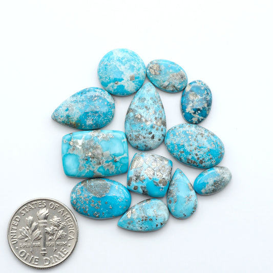 Create stunning handcrafted jewelry with Blue Bird Turquoise Cabochons. Their rich blue color and polish make them perfect for silversmiths and jewelry makers.