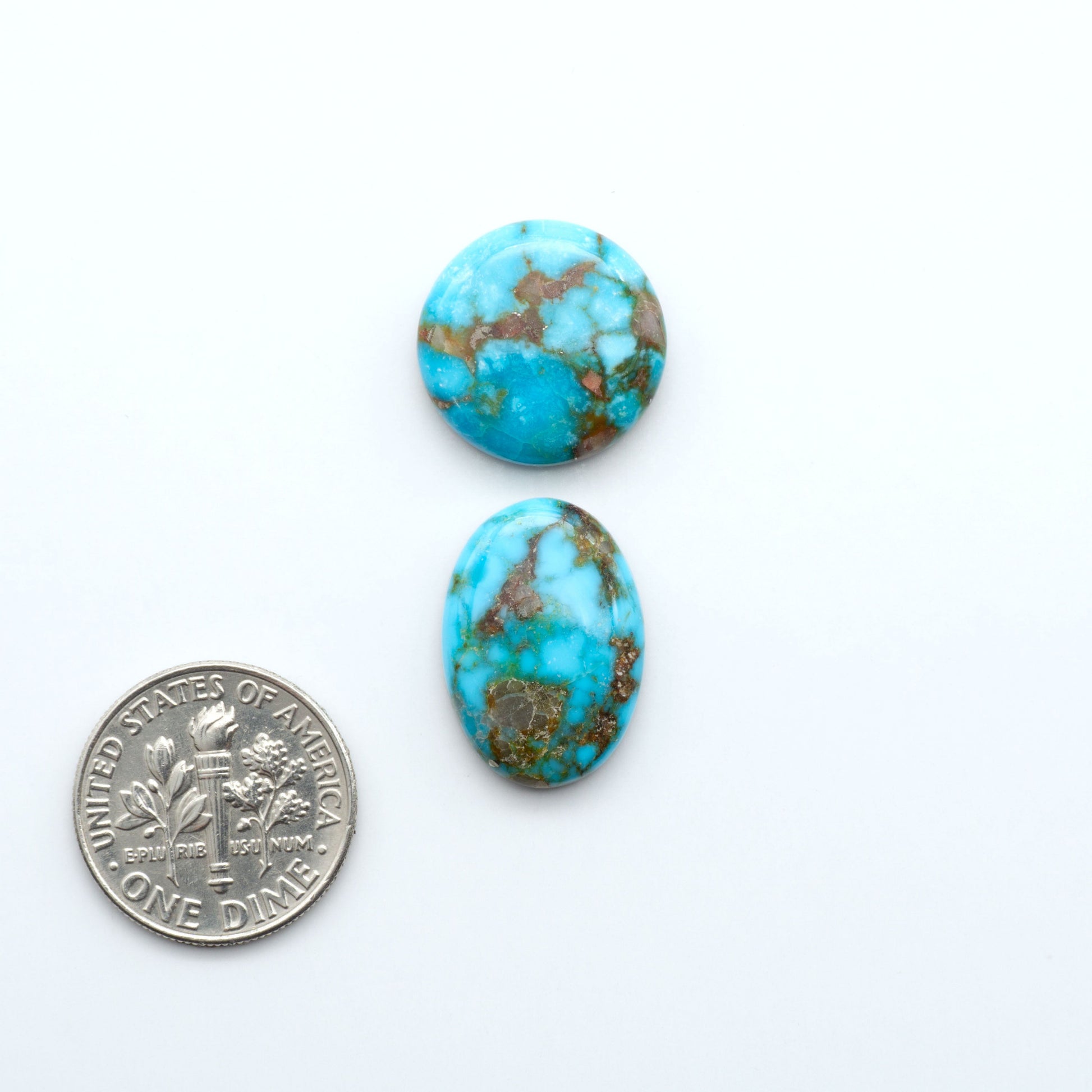 Kingman Turquoise Cabochons are a staple in the jewelry industry, known for their stunning blue-green color. Perfect for necklaces, earrings, and more!