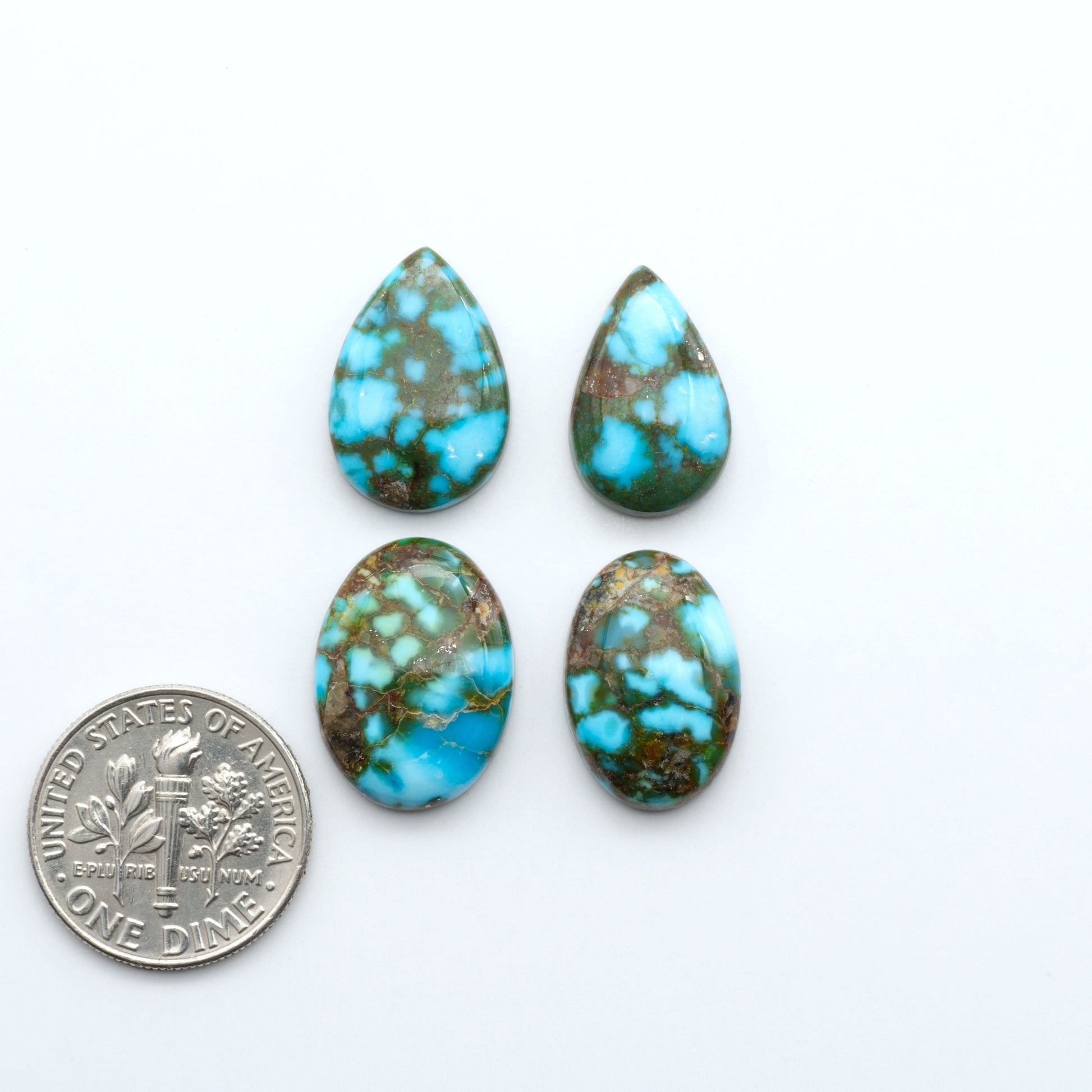 Kingman Turquoise Cabochons are a staple in the jewelry industry, known for their stunning blue-green color. Perfect for necklaces, earrings, and more!