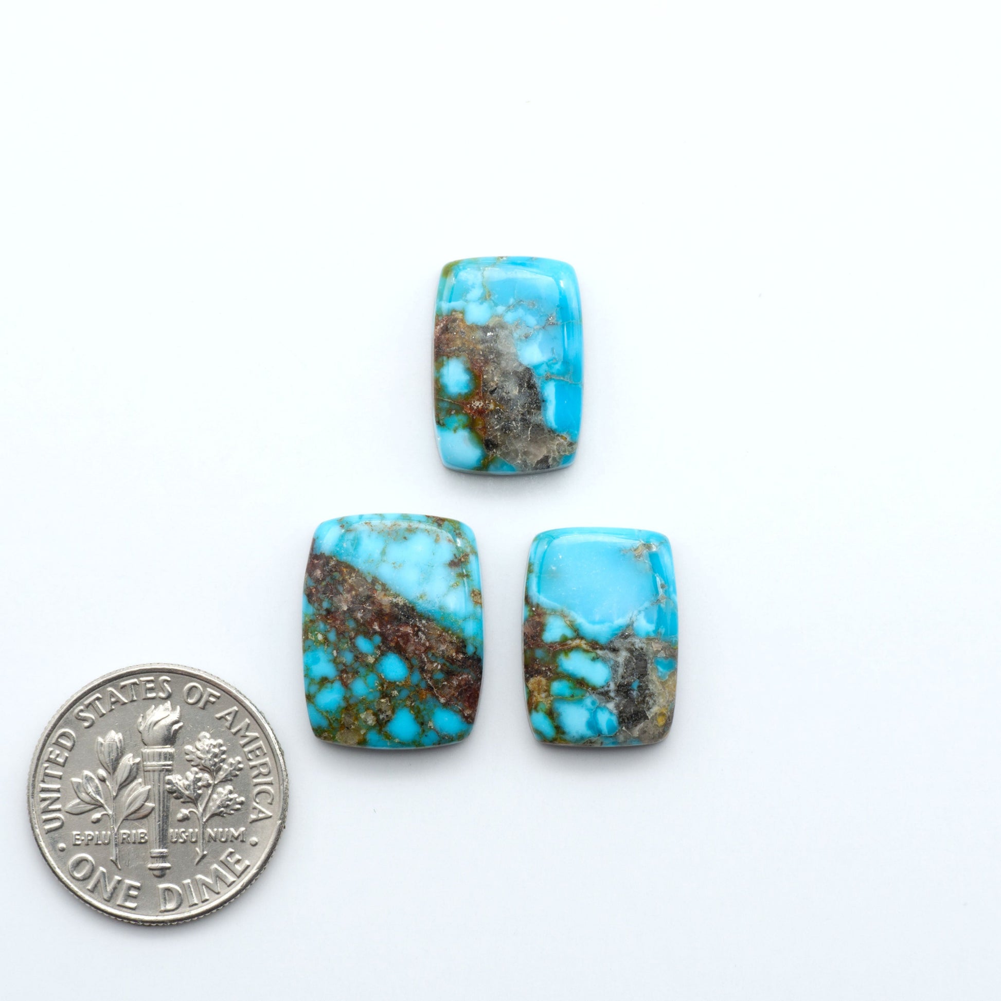 Kingman Turquoise Cabochons are a staple in the jewelry industry, known for their stunning blue-green color. Perfect for necklaces, earrings, and more!