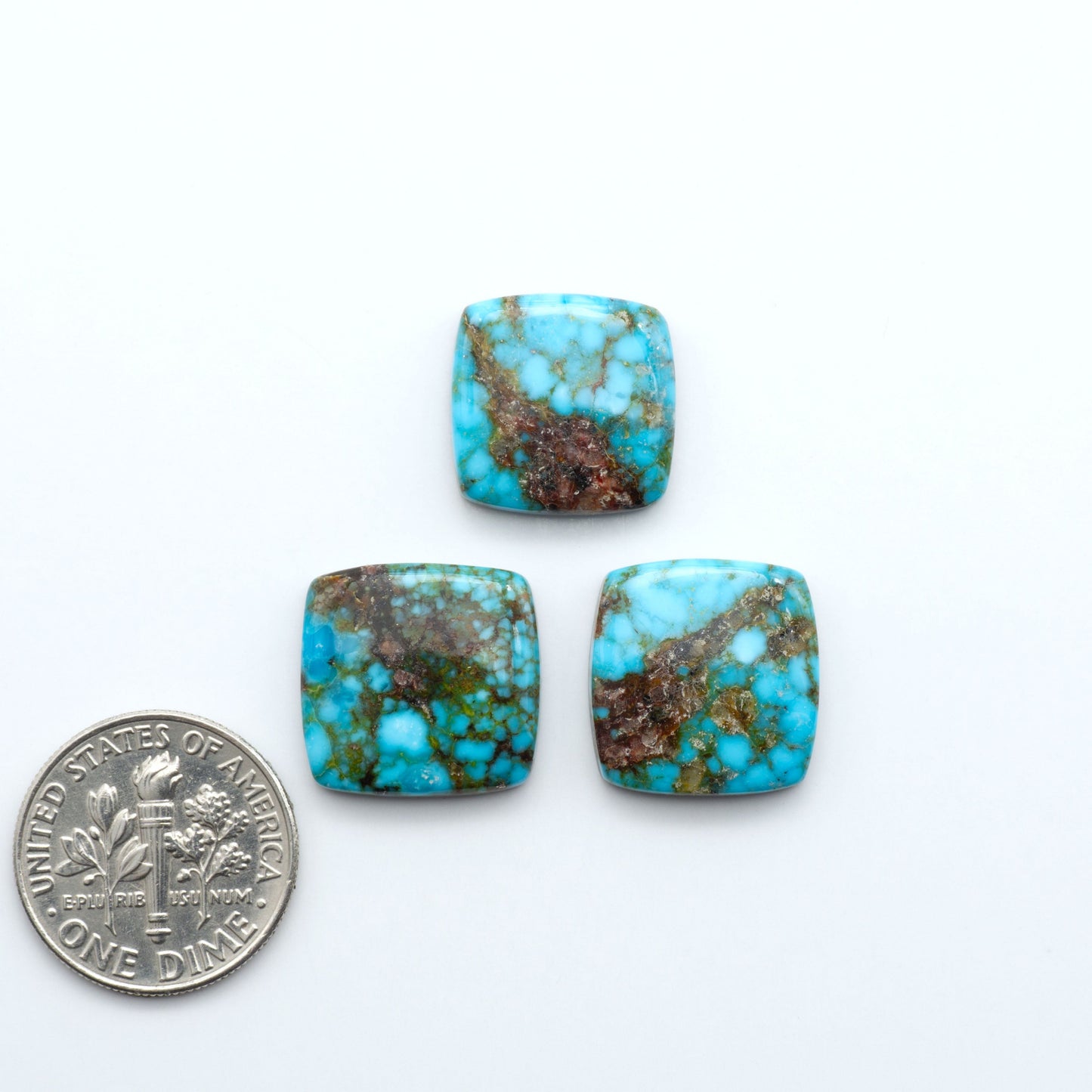 Kingman Turquoise Cabochons are a staple in the jewelry industry, known for their stunning blue-green color. Perfect for necklaces, earrings, and more!