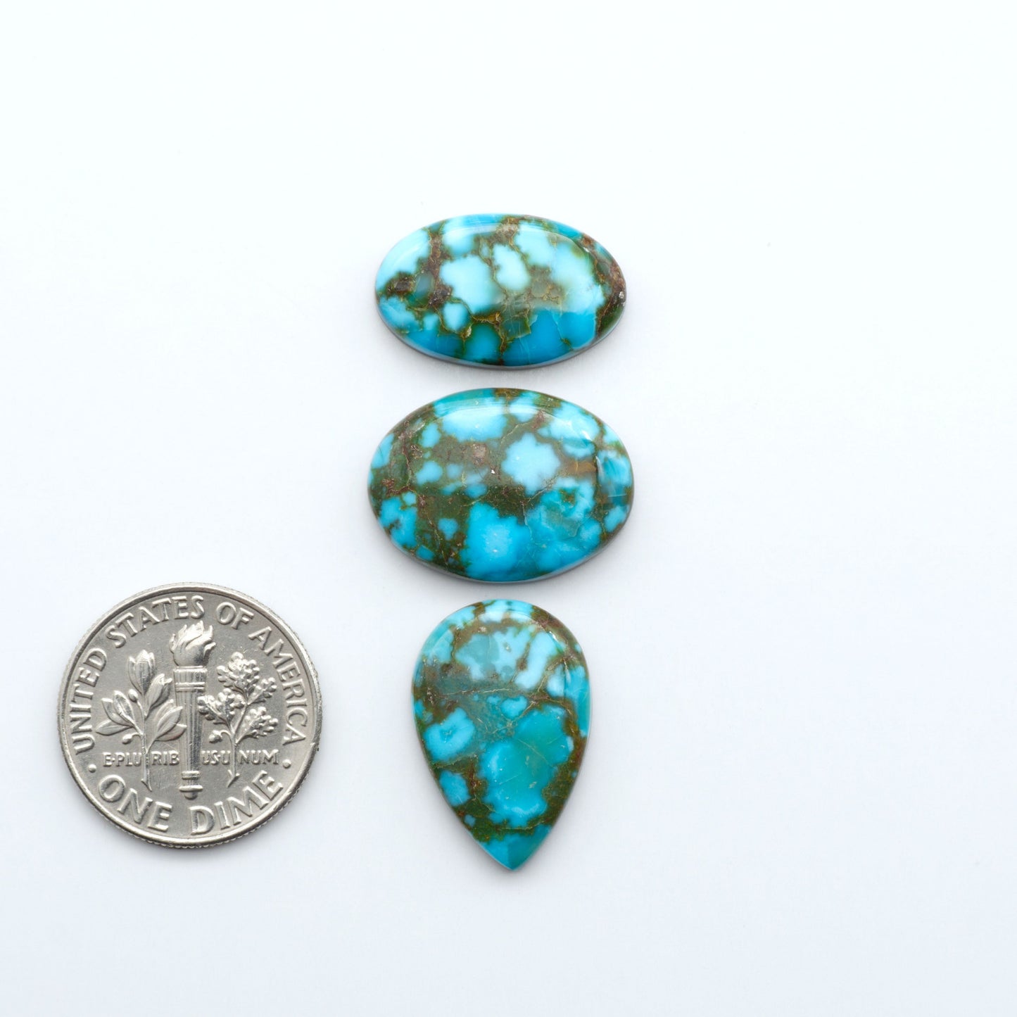Kingman Turquoise Cabochons are a staple in the jewelry industry, known for their stunning blue-green color. Perfect for necklaces, earrings, and more!