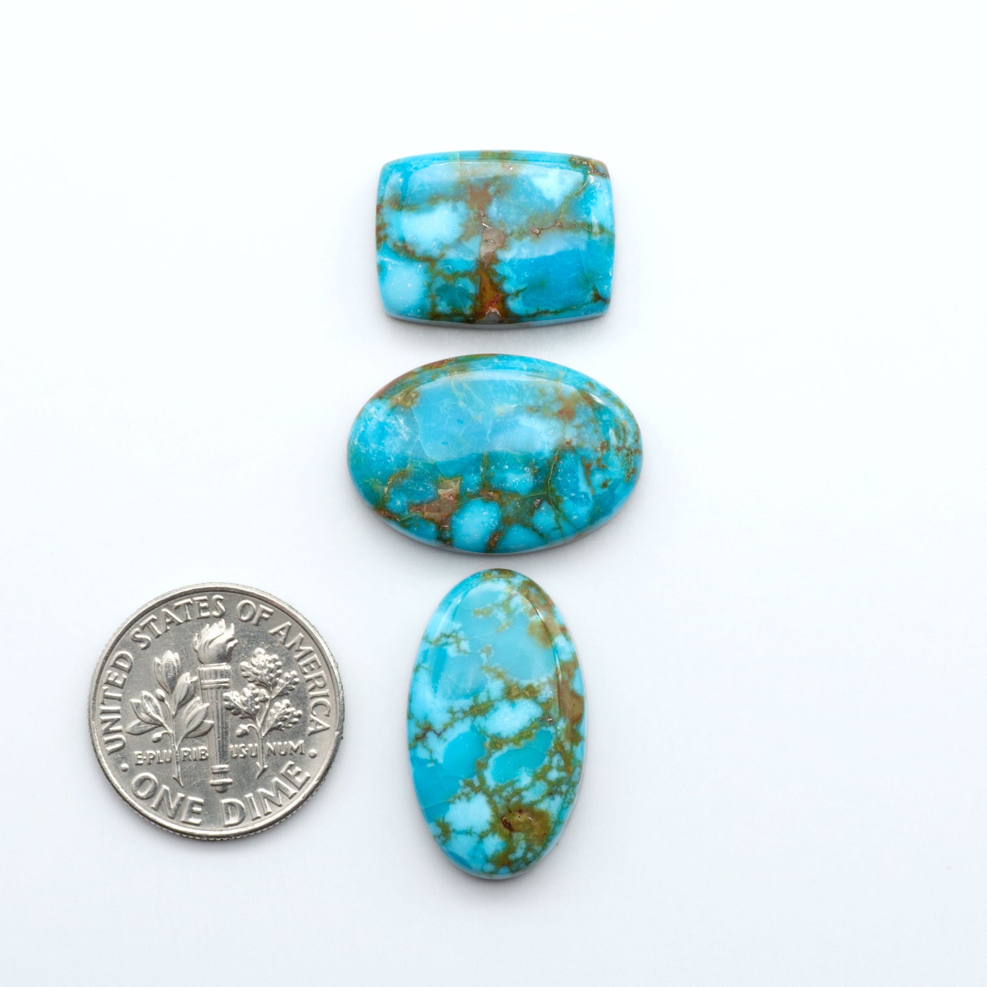 Kingman Turquoise Cabochons are a staple in the jewelry industry, known for their stunning blue-green color. Perfect for necklaces, earrings, and more!