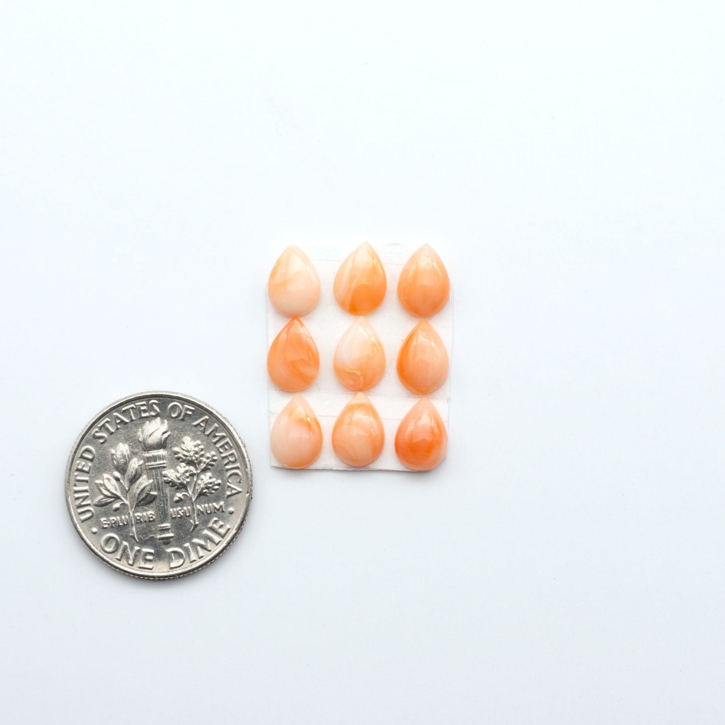 Discover natural pink Coral cabochons with soft salmon hues and smooth polish, ideal for creating timeless handcrafted rings, pendants, and custom designs.